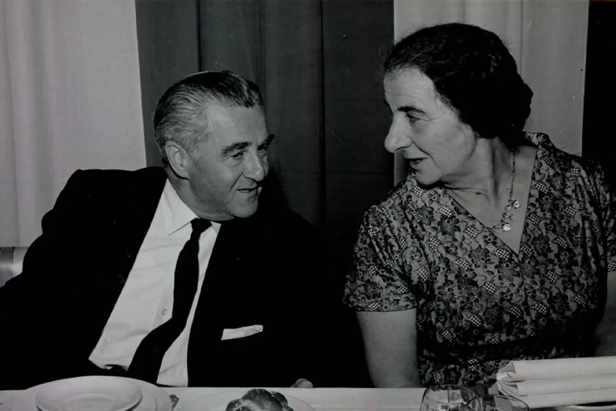 Dewey Stone speaking with Israeli Prime Minister Golda Meir.