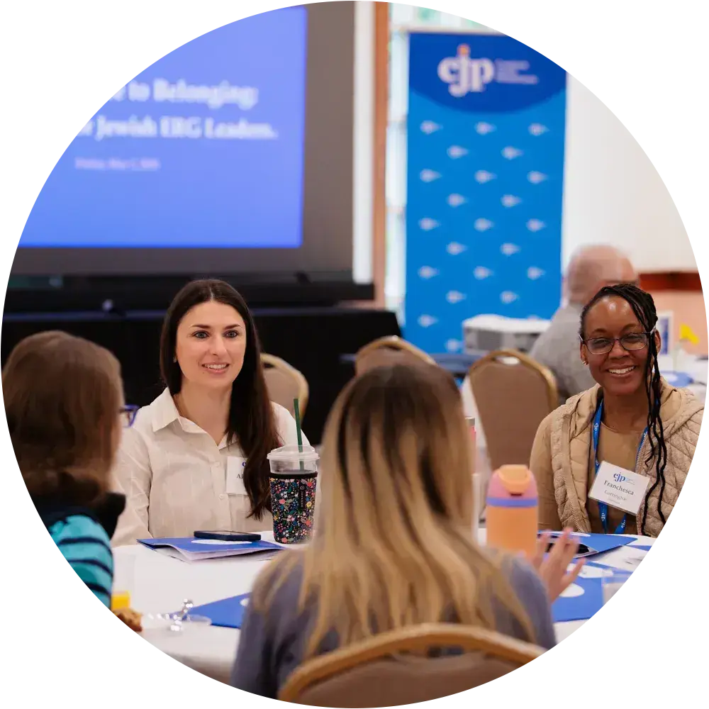 Professionals participating in a workplace employee resource group workshop.