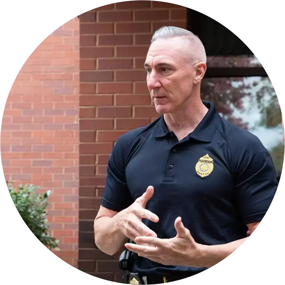 Security professional providing safety guidance at a Greater Boston Jewish community space.